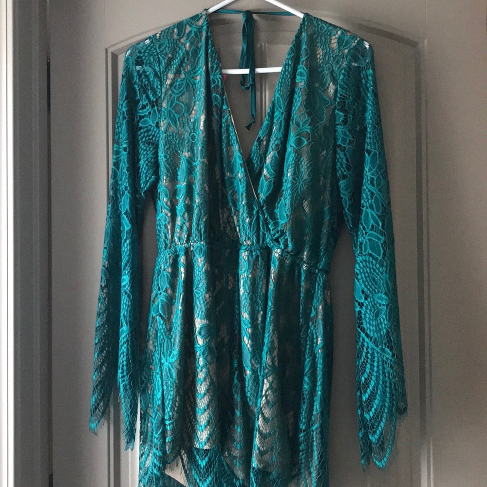 Turquoise v-neck romper NWT